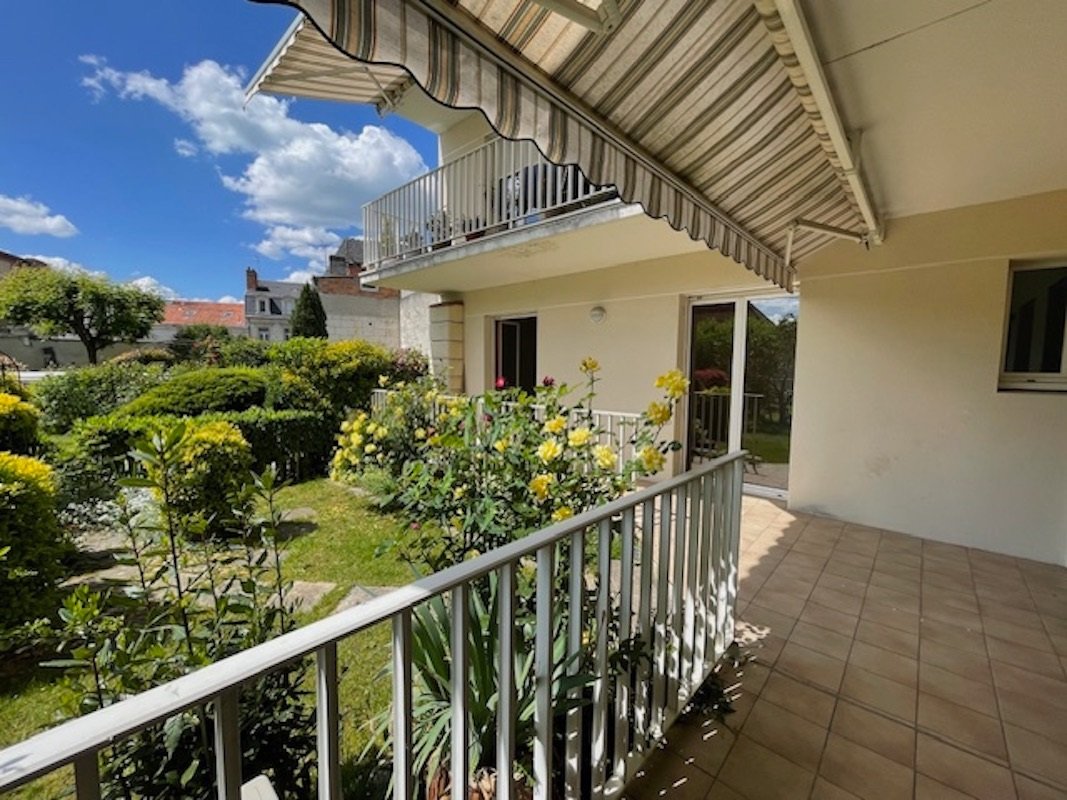 Cœur de ville, appartement T4 avec jardin et garage.