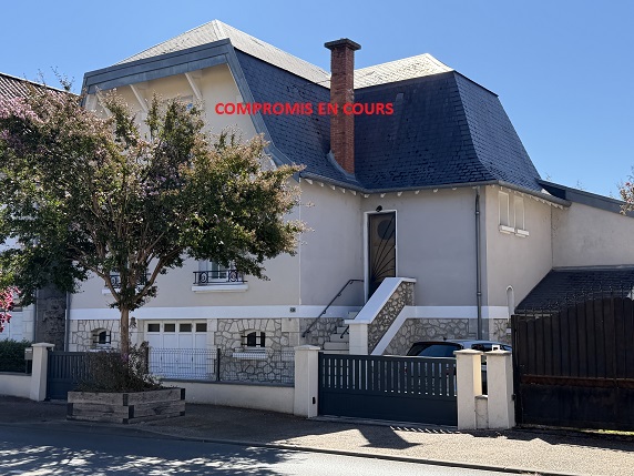 Maison 3 chambres et garage.